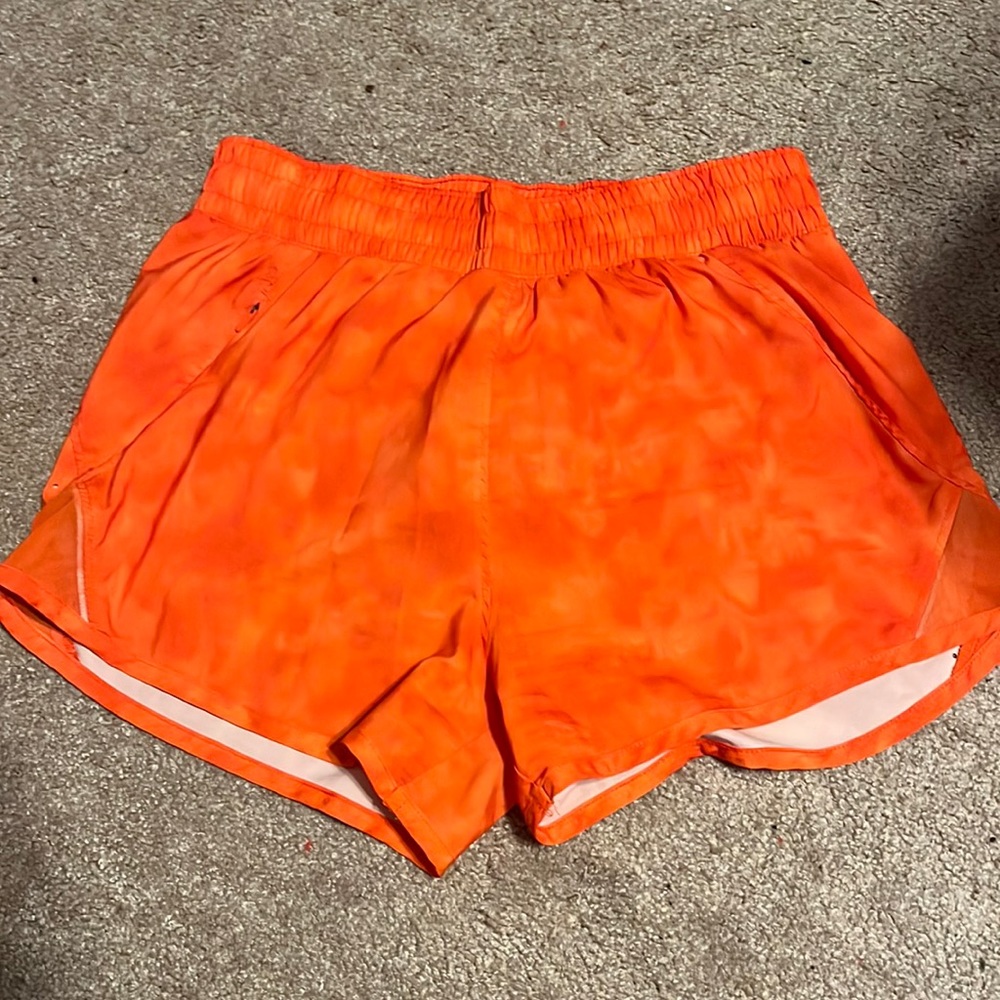 Target athletic bright pants. Has built in underwear and one zipper pocket.